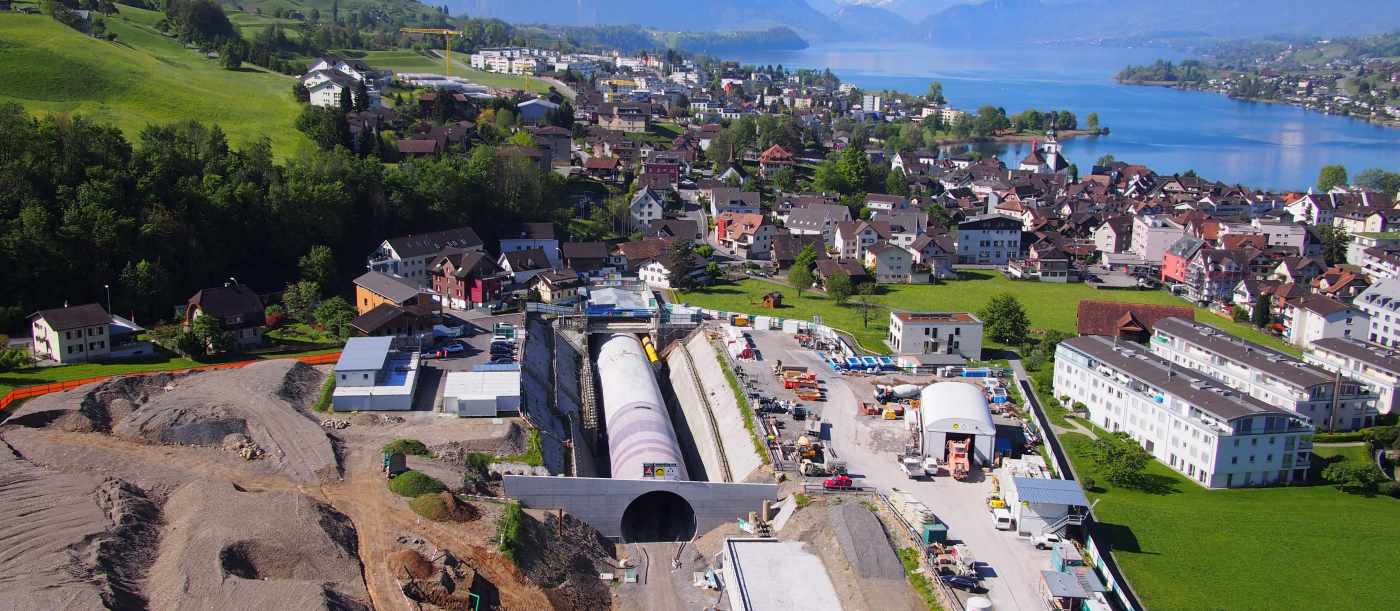 Südumfahrung Küssnacht, 
Abschnitt Ebnet, Räbmatt, Erstellung und Unterhalt Baufixpunktnetz, Bauabsteckungen, Vortriebskontrolle Tunnelbau, Profilüberwachungen Tunnelbau, Erfassen und Erstellen von digitalen Geländemodellen, Volumenberechnungen, Diverse Kontrollaufnahmen der Bauten, Setzungs- und Verschiebungsmessungen, Drohnenvermessung